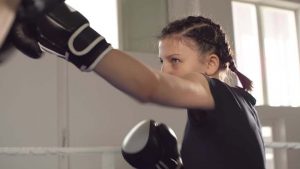 Young girl doing non contact boxing exercises